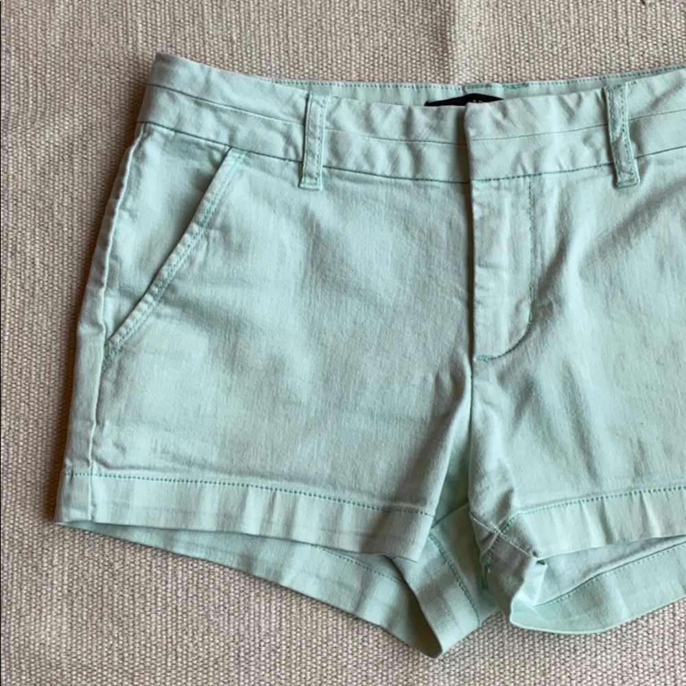 mint green shorts
